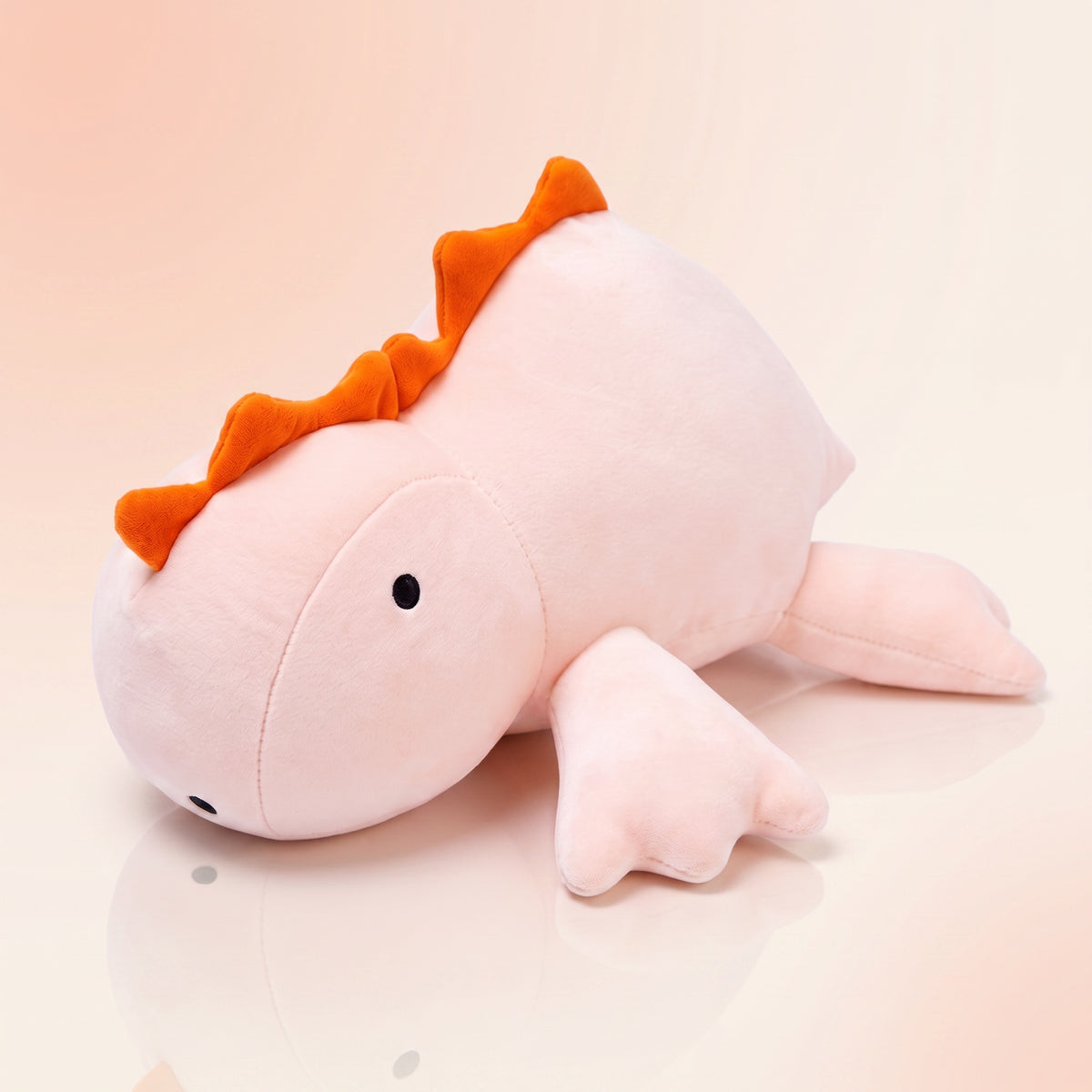 Peluche lestée Dino rose, fond pastel