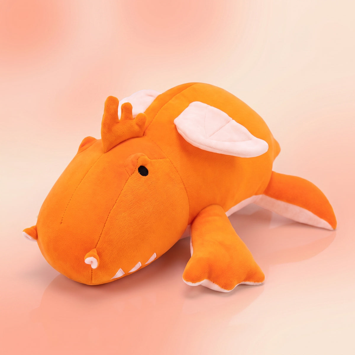 Peluche lestée Dragon orange, fond pastel